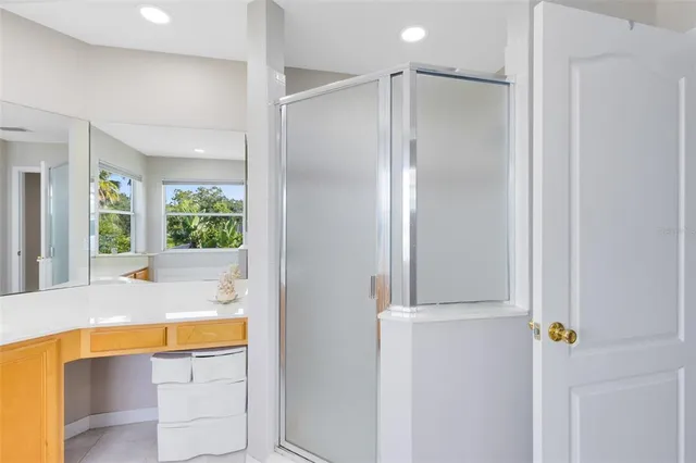 a bathroom with a tub and shower