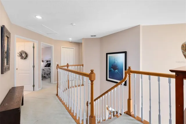 a view of a hallway with kids bedroom