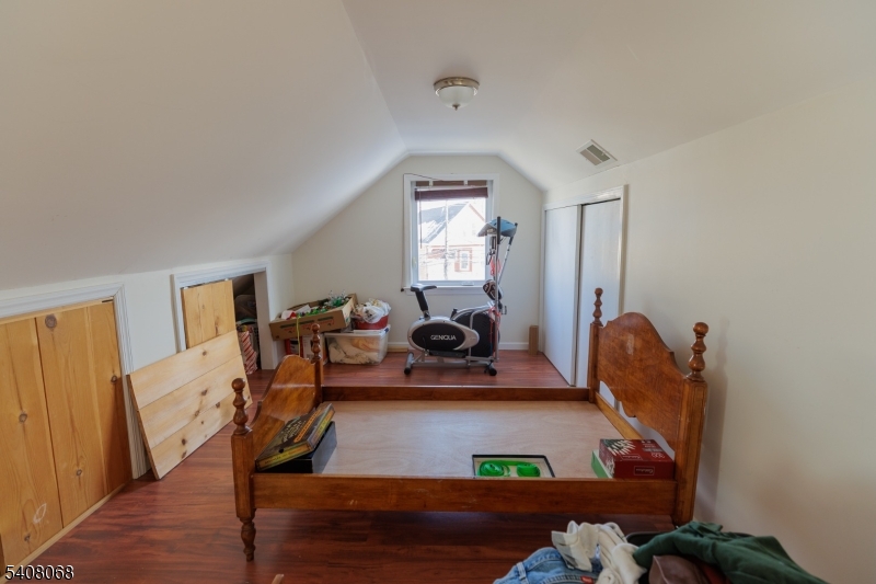 348 Cherry Street Elizabeth, NJ 07208 - Photo 15 of 28 a room with furniture and a window