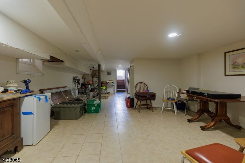 348 Cherry Street Elizabeth, NJ 07208 - Photo 24 of 28 a view of a room with gym equipment