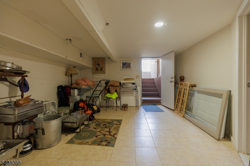 348 Cherry Street Elizabeth, NJ 07208 - Photo 25 of 28 a view of a room with gym equipment