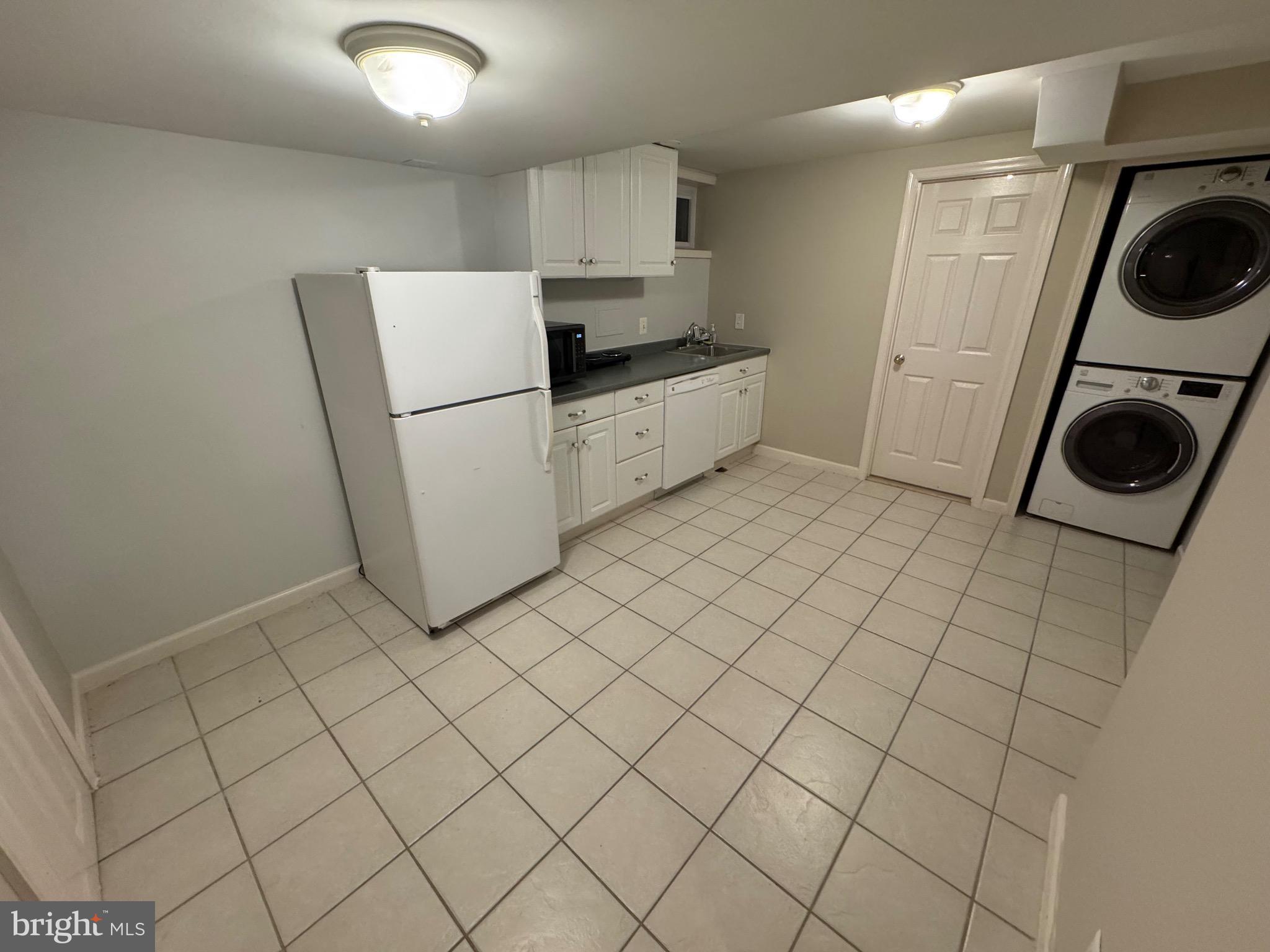 201 East Indian Spring Drive Silver Spring, MD 20901 - Photo 22 of 30 Basement kitchenette and in-law suite laundry