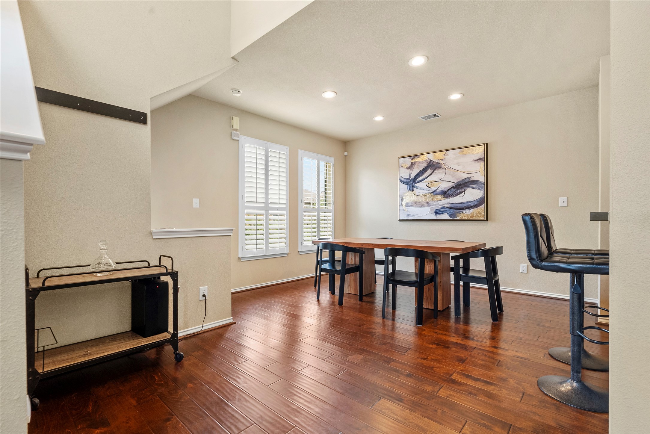 5239 Schuler Street, Unit C Houston, TX 77007 - Photo 13 of 16 a view of a a dining room with furniture window and wooden floor
