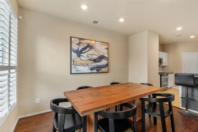 a view of a dining room with furniture