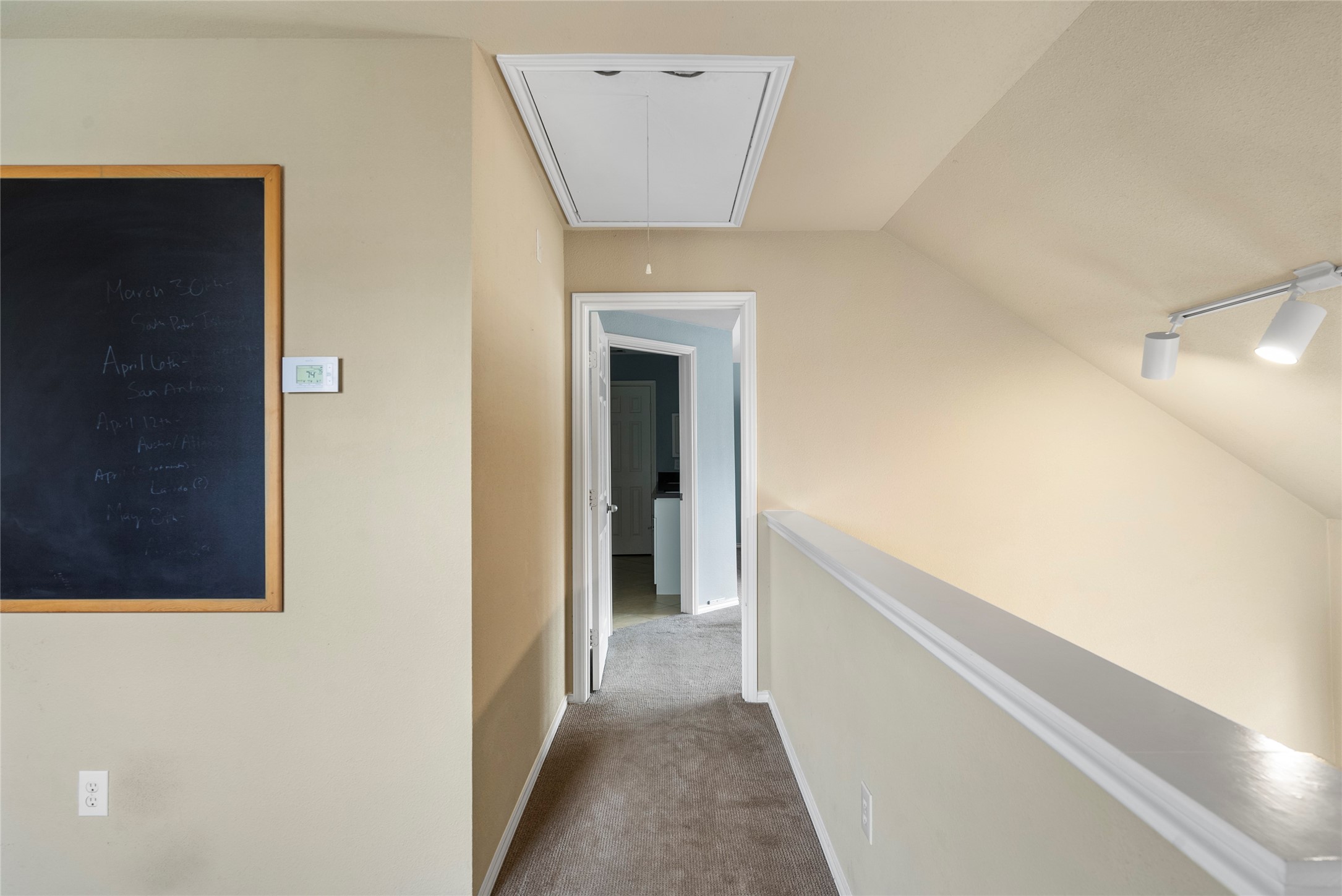5239 Schuler Street, Unit C Houston, TX 77007 - Photo 9 of 16 a view of a hallway with wooden floor and a bathroom