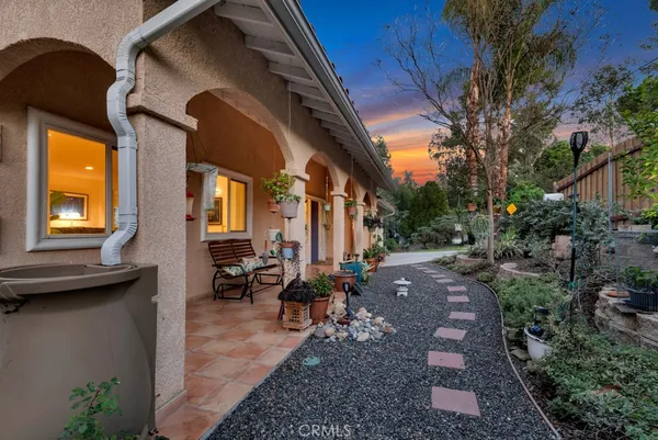 a view of balcony with furniture