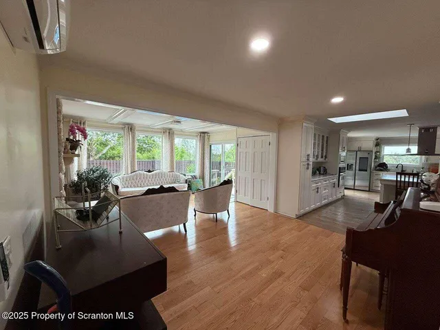 a view of closet with mirror