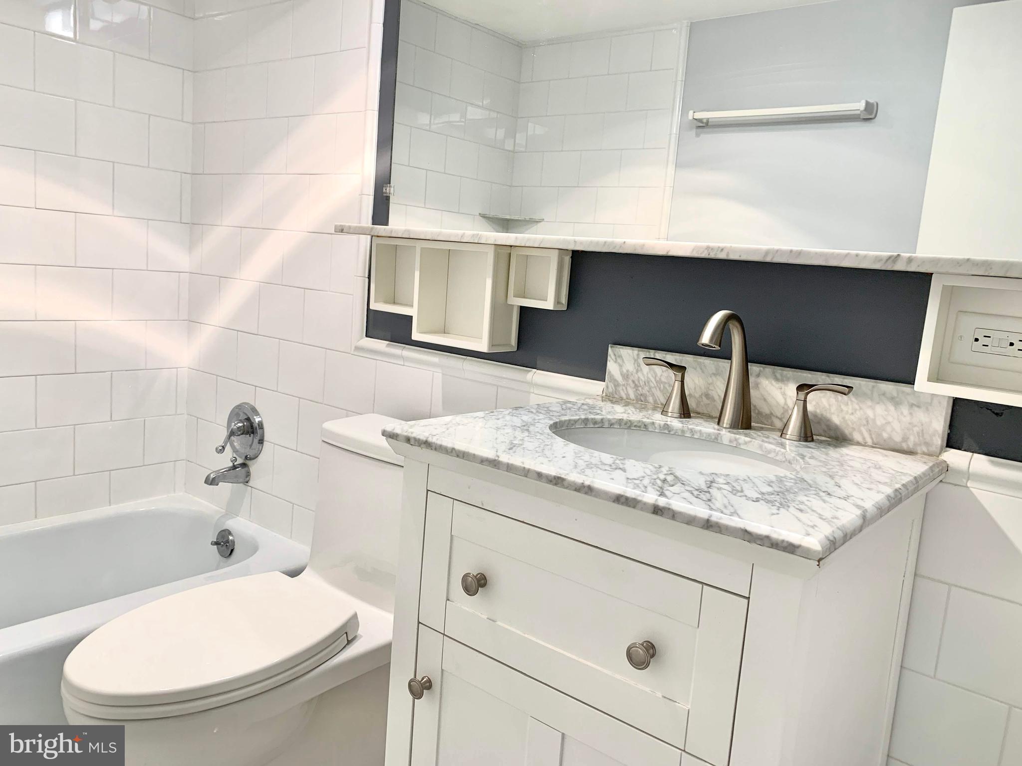 490 M Street Southwest, Unit W603 Washington, DC 20024 - Photo 11 of 31 Gorgeous bath with tub shower