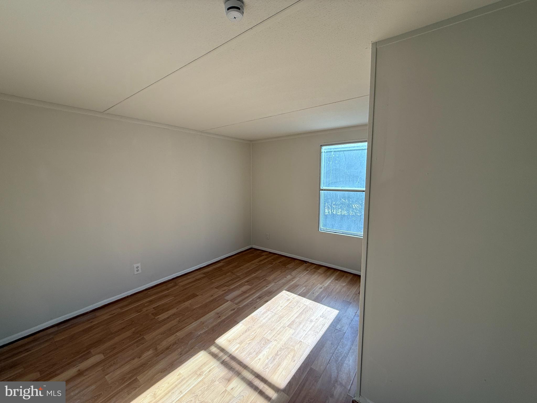 3611 Shirleys Hill Road Partlow, VA 22534 - Photo 7 of 25 a view of an empty room and window
