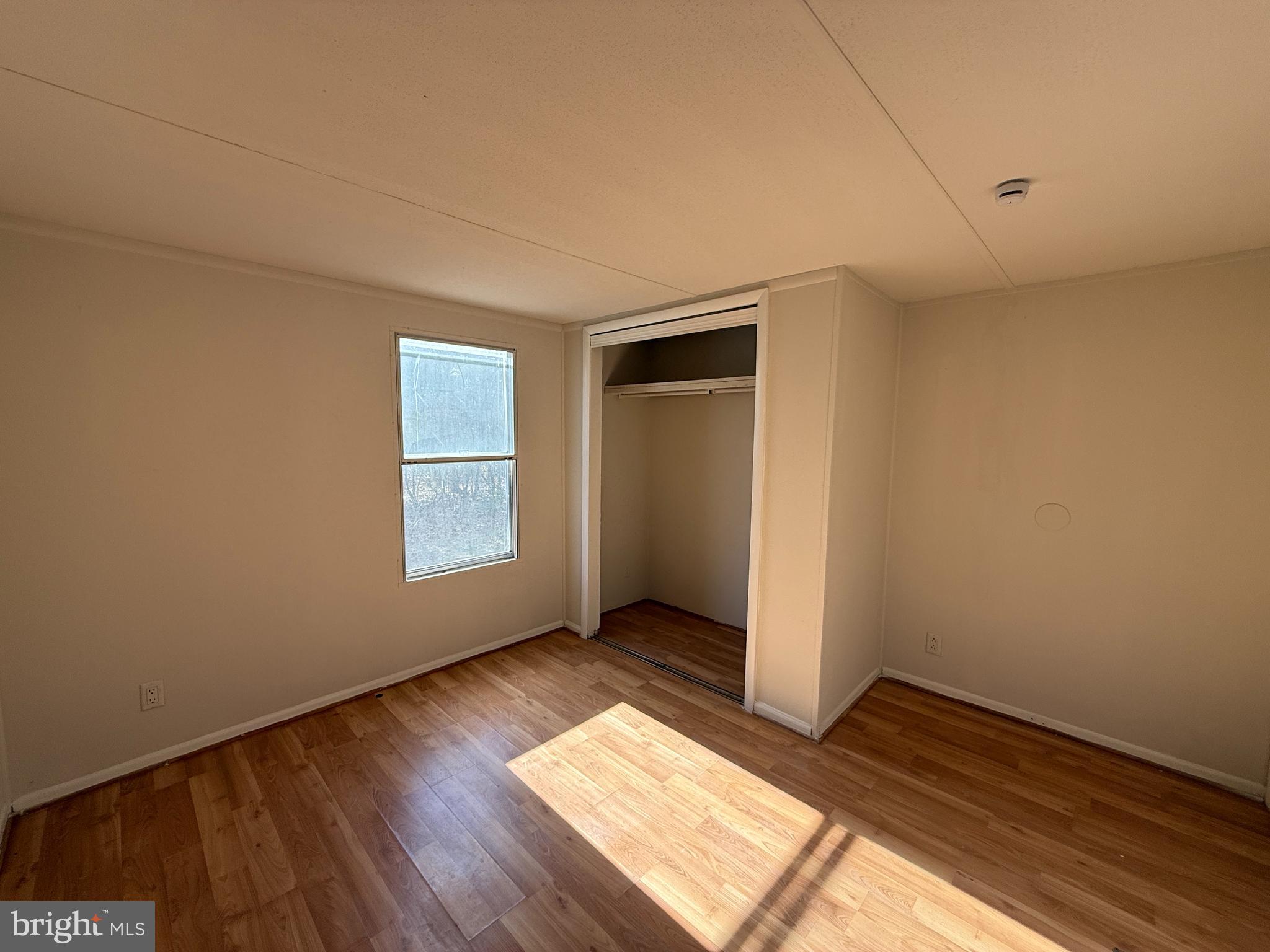 3611 Shirleys Hill Road Partlow, VA 22534 - Photo 8 of 25 a view of wooden floor and windows in a room