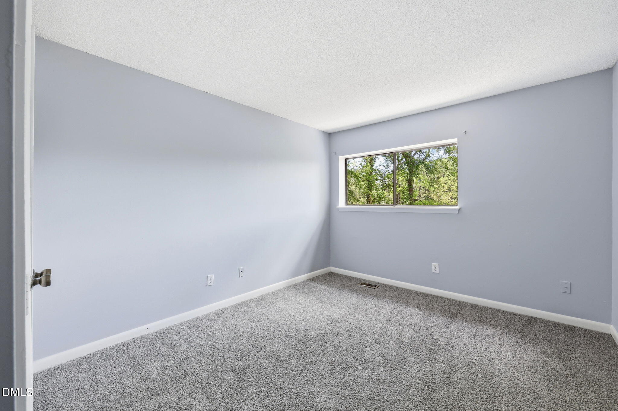 5043 Tall Pines Court Raleigh, NC 27609 - Photo 20 of 37 an empty room with windows