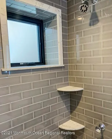 a room with gym equipment and a table