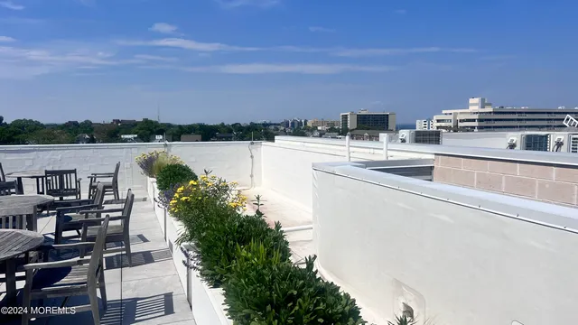 a view of a balcony with a ocean view