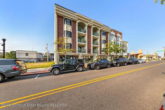 a view of swimming pool with outdoor seating