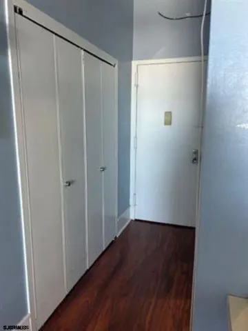a kitchen with a sink cabinets and appliances
