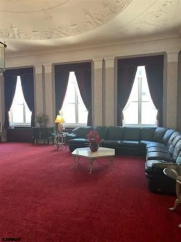 a room with furniture and a window