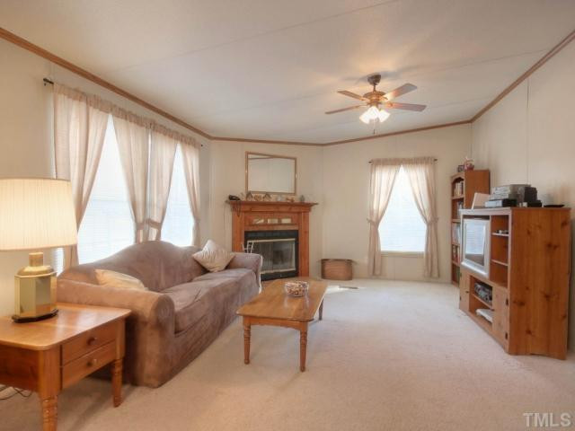 2016 Sandy Plains Road Wake Forest, NC 27587 - Photo 7 of 18 Gather around the Masonry fireplace and enjoy a cozy evening on a cold winter day. Great lighting and space. Great bang for the buck! Den/Family/Great Room