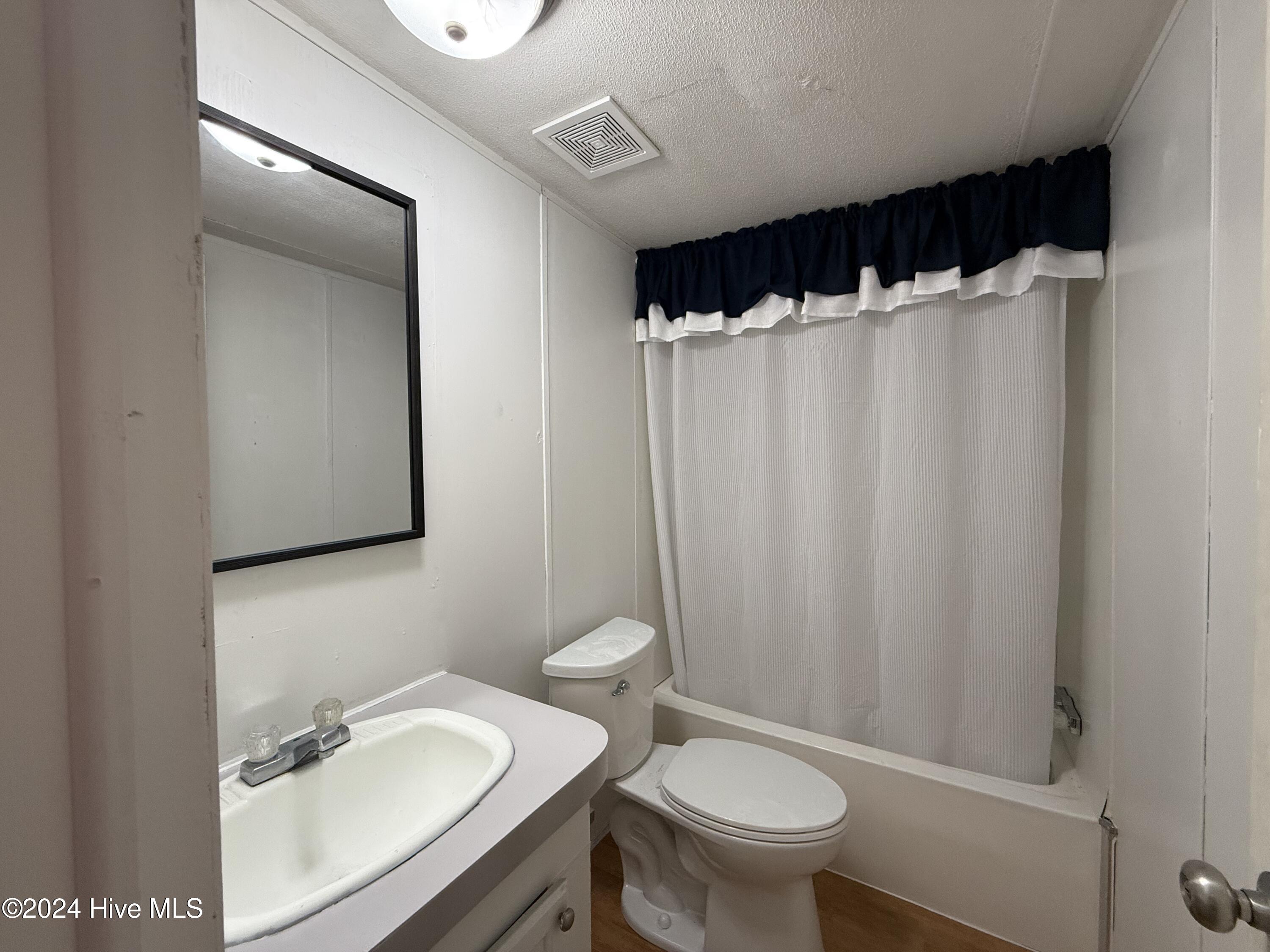 1136-1132 Glancy Road Swansboro, NC 28584 - Photo 65 of 76 1132 Hall Bathroom