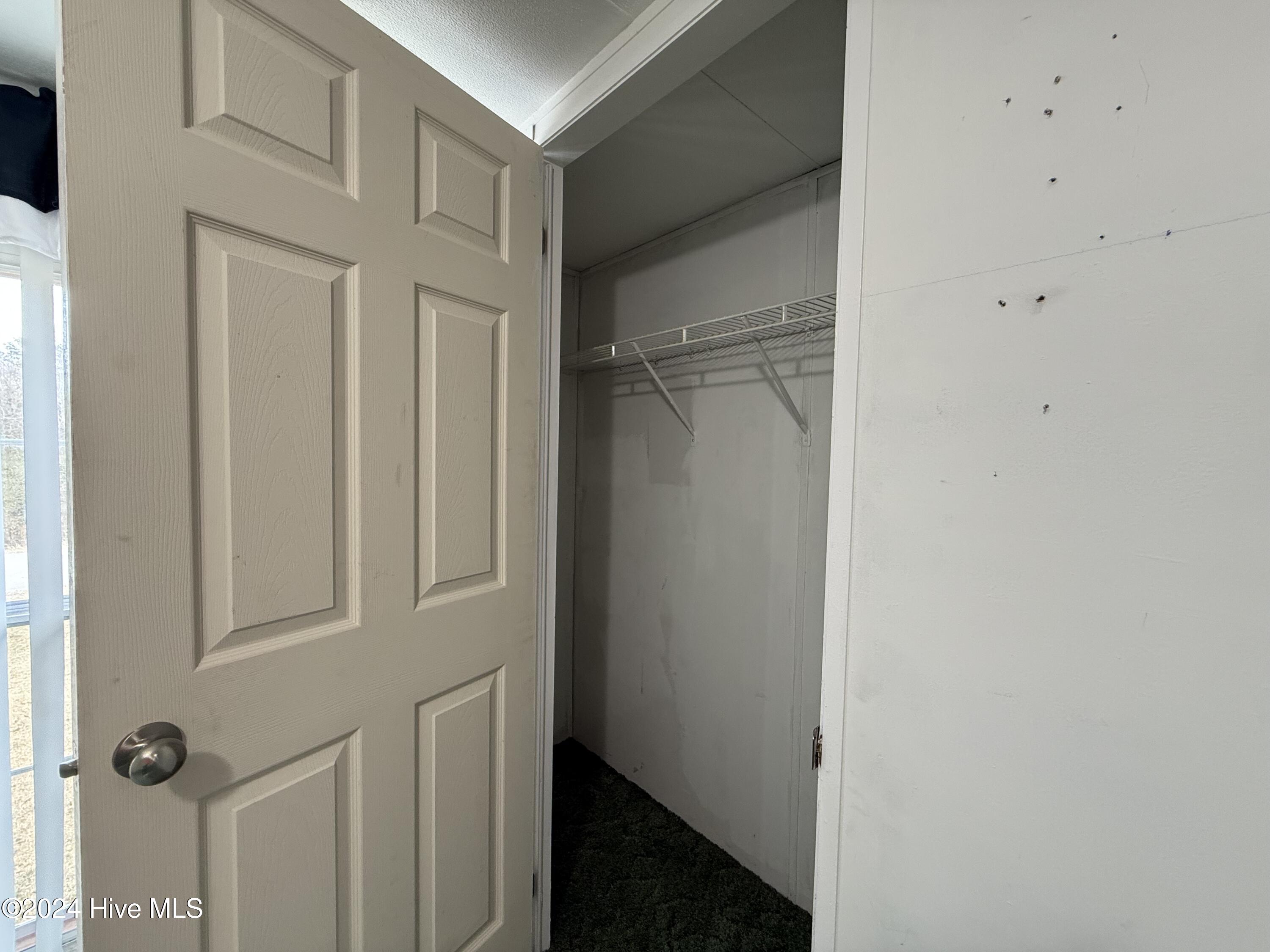 1136-1132 Glancy Road Swansboro, NC 28584 - Photo 73 of 76 1132 Spare Room 1 Closet