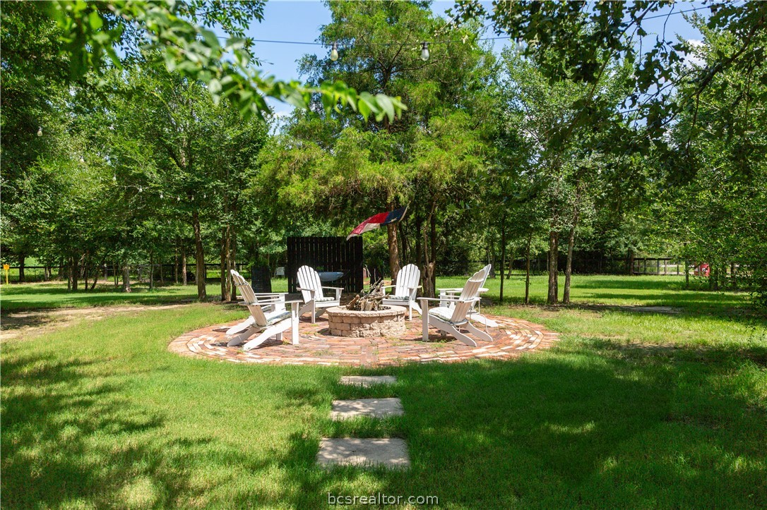 5036 Glory Road Bryan, TX 77808 - Photo 45 of 50 In ground custom fire pit with seating