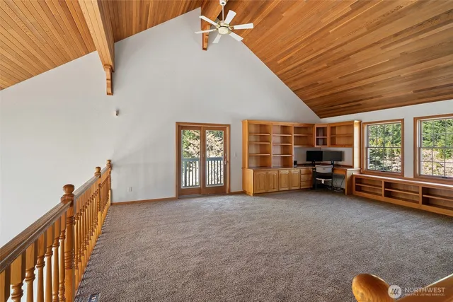 a view of livingroom with furniture and windows
