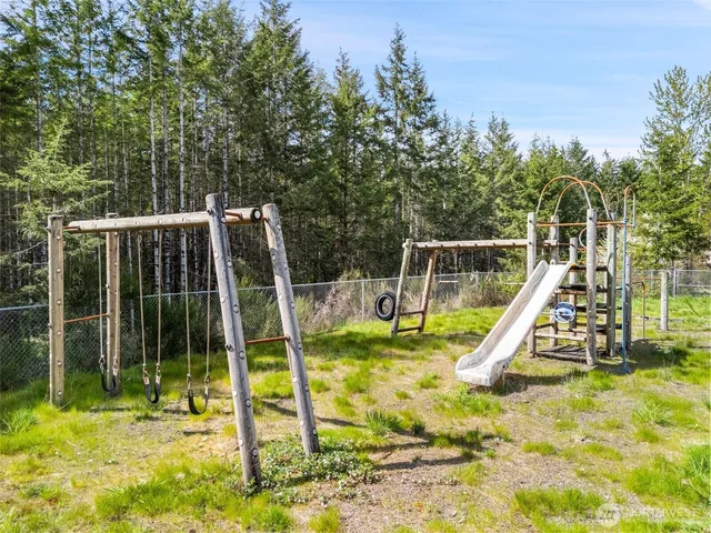 a view of a house with a small park