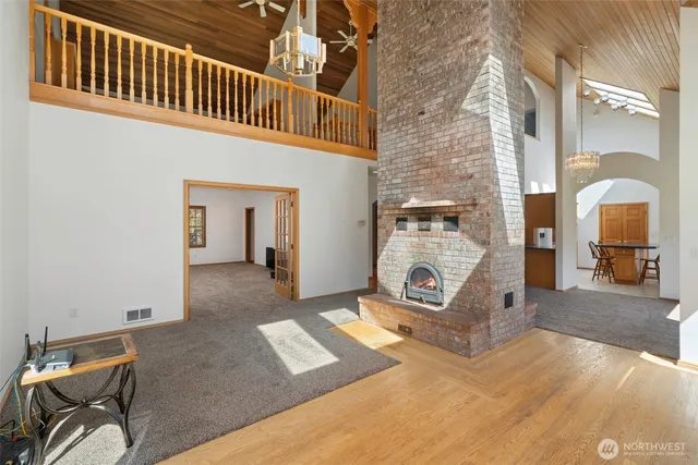 a view of a livingroom with a fireplace and furniture