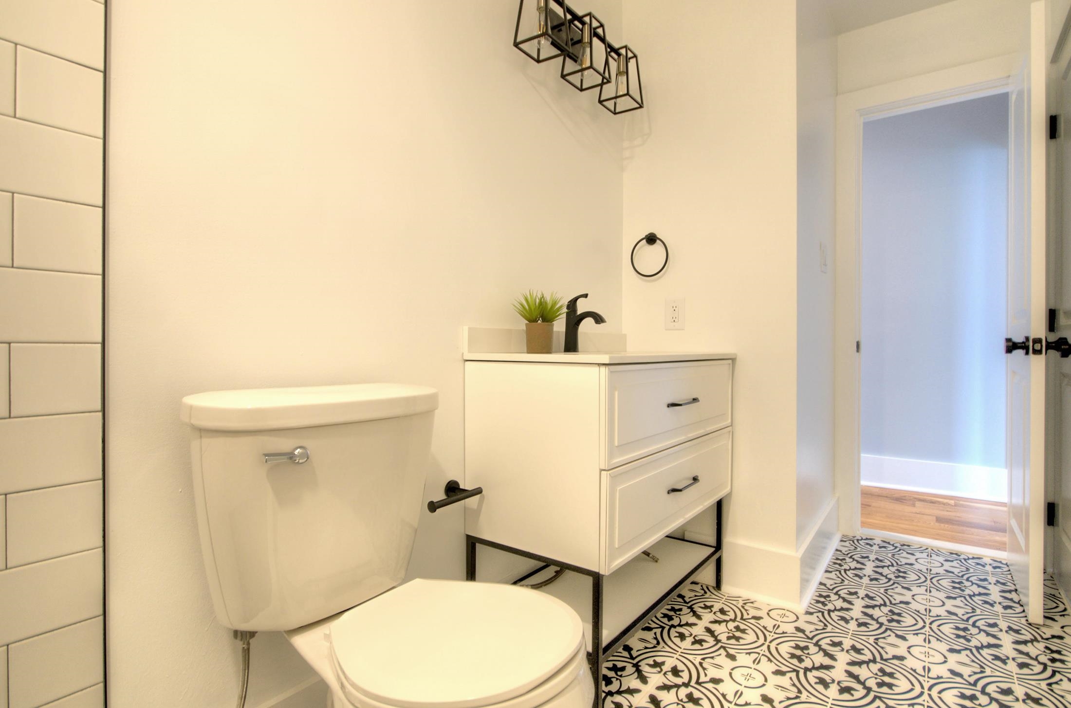 320 40th Street Avalon, NJ 08202 - Photo 24 of 39 a bathroom with a sink a toilet and shower