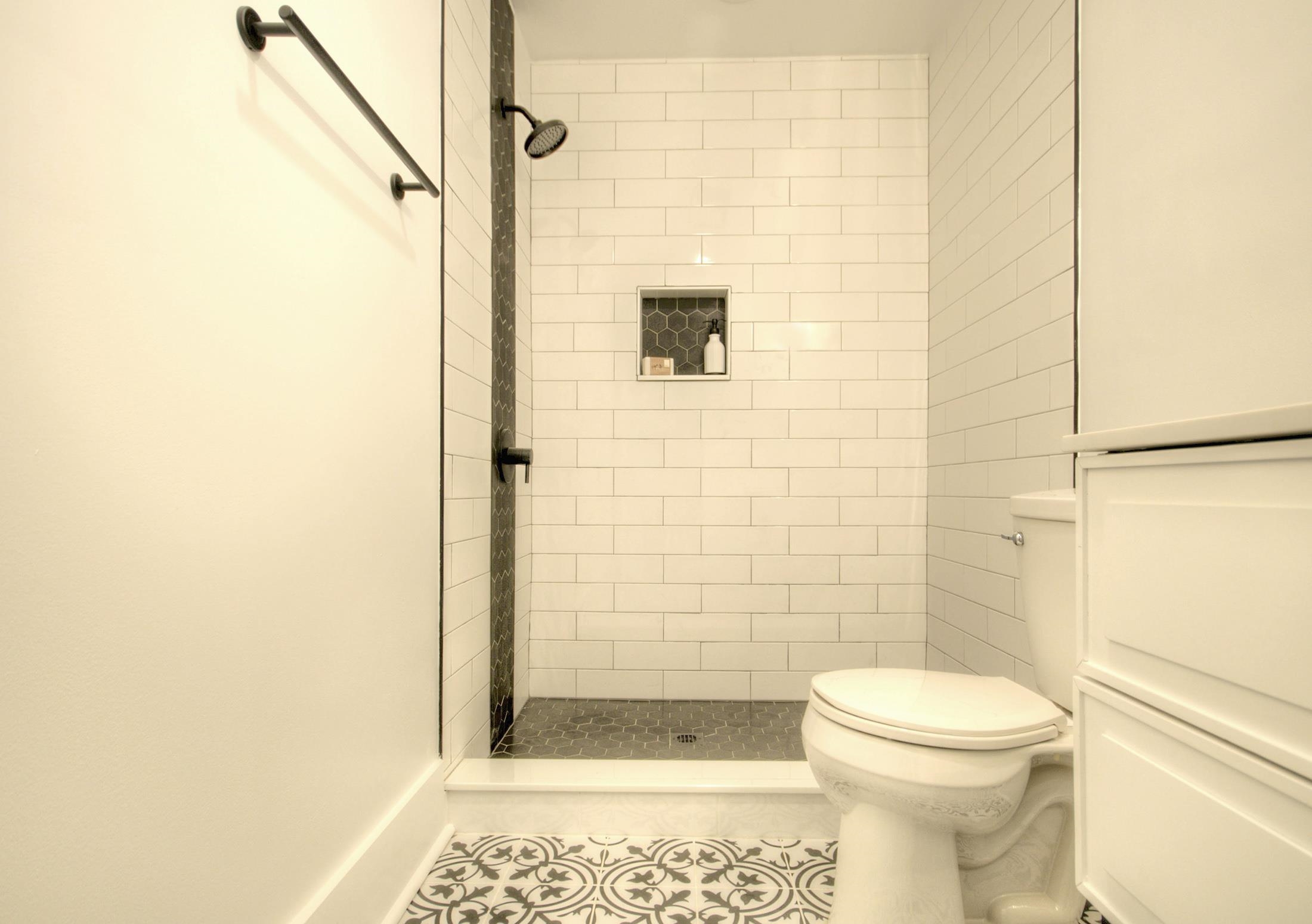 320 40th Street Avalon, NJ 08202 - Photo 25 of 39 a bathroom with a toilet and shower