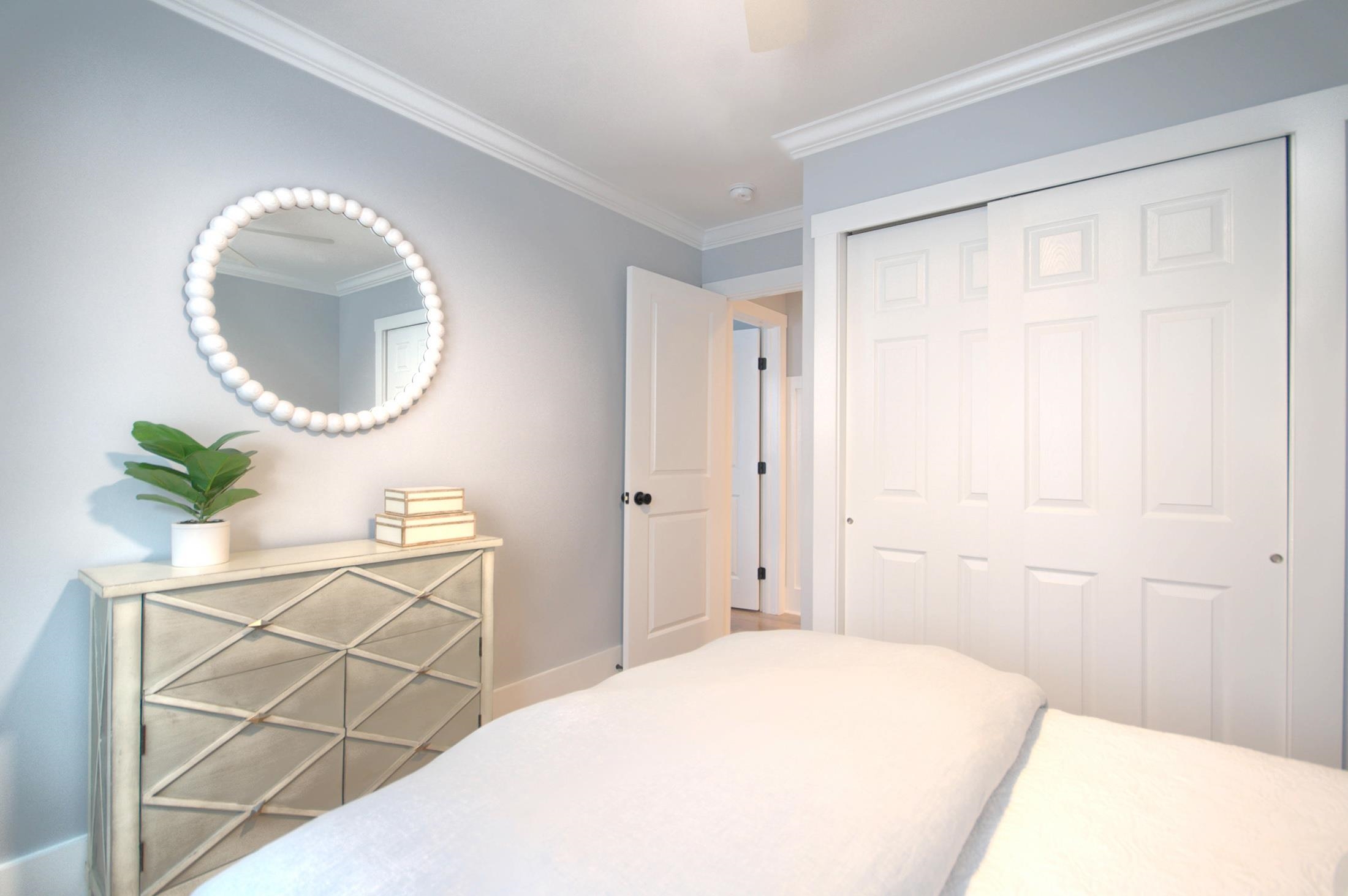 320 40th Street Avalon, NJ 08202 - Photo 32 of 39 a bedroom with a bed and a mirror