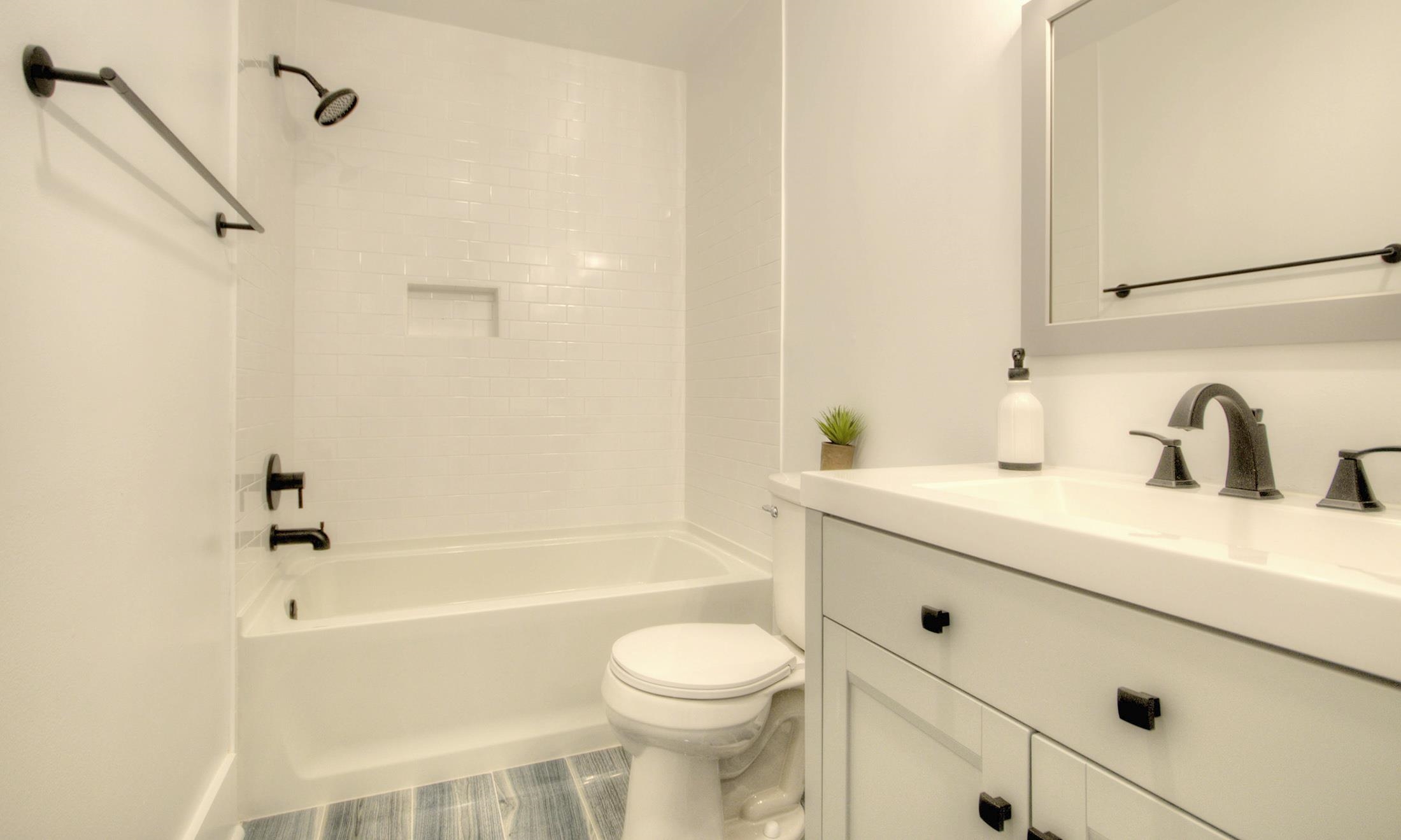 320 40th Street Avalon, NJ 08202 - Photo 36 of 39 a bathroom with a sink toilet and shower