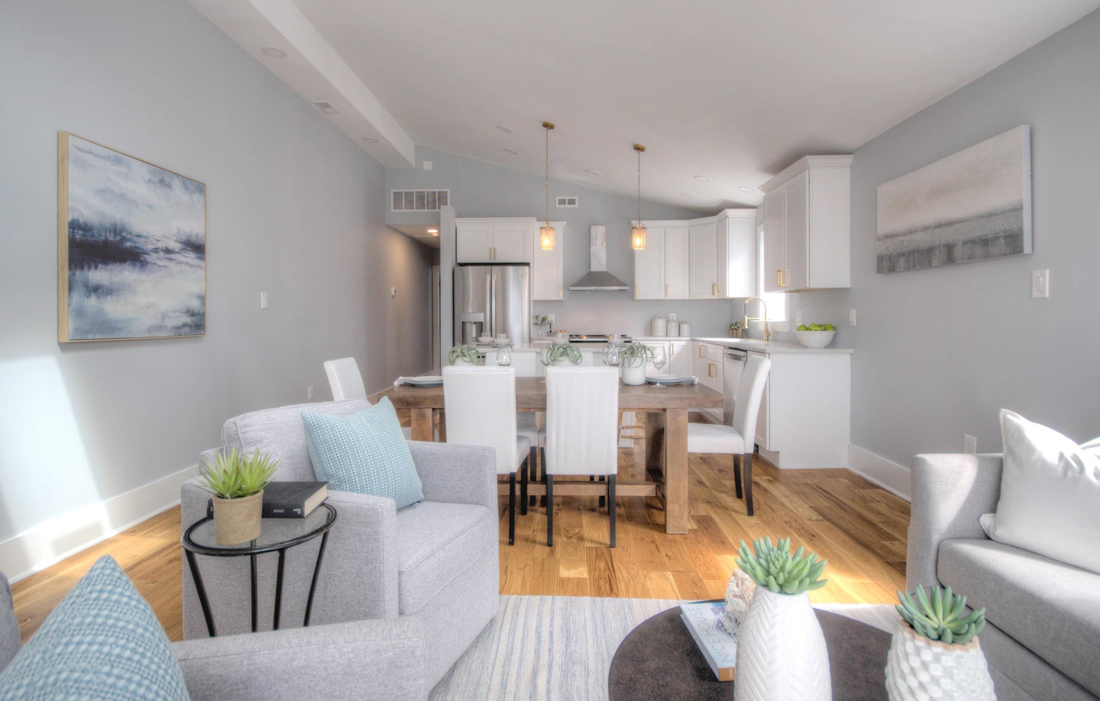320 40th Street Avalon, NJ 08202 - Photo 7 of 39 a living room with stainless steel appliances furniture and a kitchen view