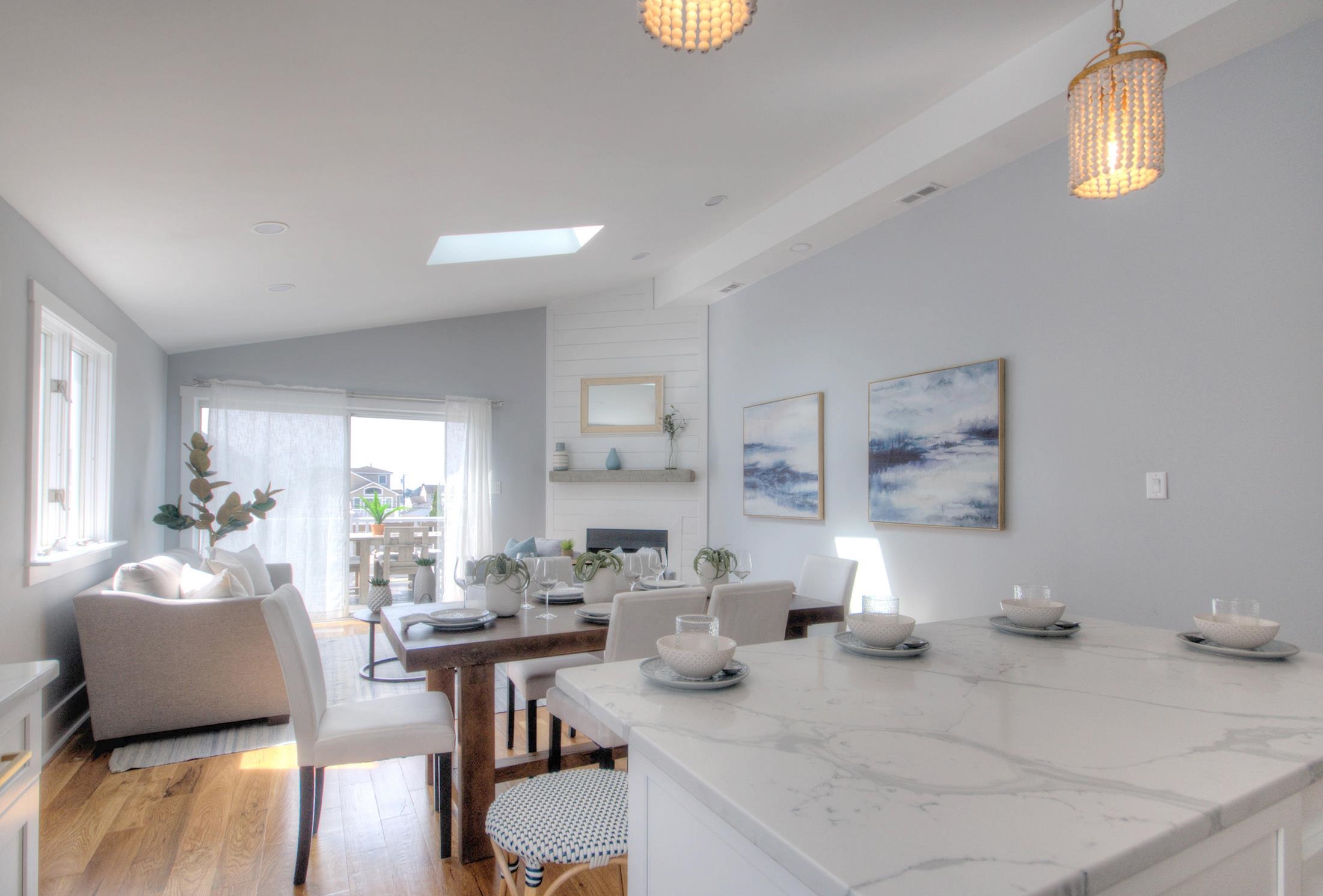 320 40th Street Avalon, NJ 08202 - Photo 10 of 39 a living room with furniture and a wooden floor
