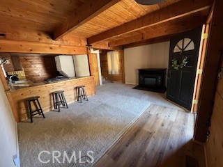 1374 Rock Ridge Way Lake Arrowhead, CA 92352 - Photo 3 of 9 a view of a livingroom with furniture and a fireplace