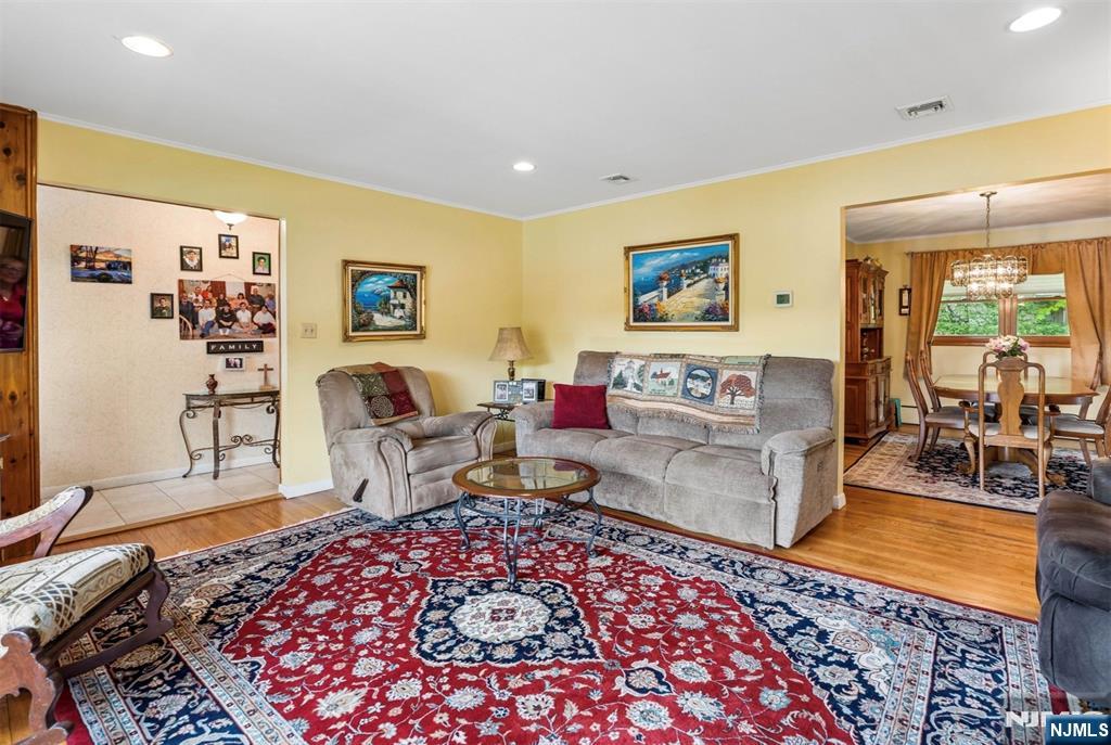6 Waters Edge Butler, NJ 07405 - Photo 5 of 28 a living room with furniture and a rug