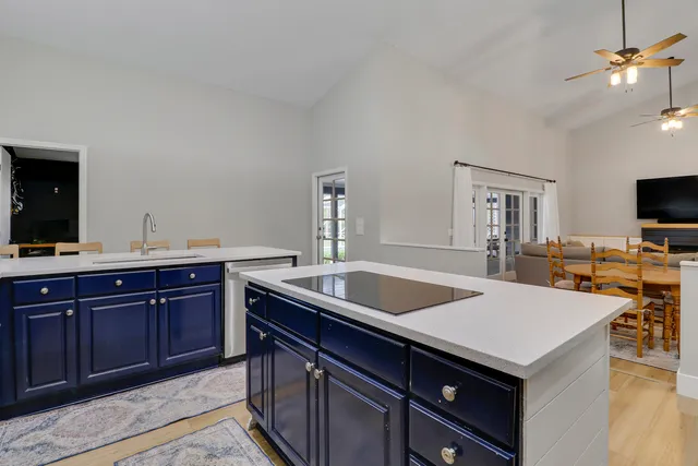 a kitchen with a stove and a sink