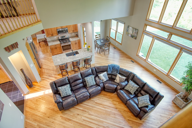 115 North Prospect Avenue Streamwood, IL 60107 - Photo 2 of 41 a living room with furniture and a large window