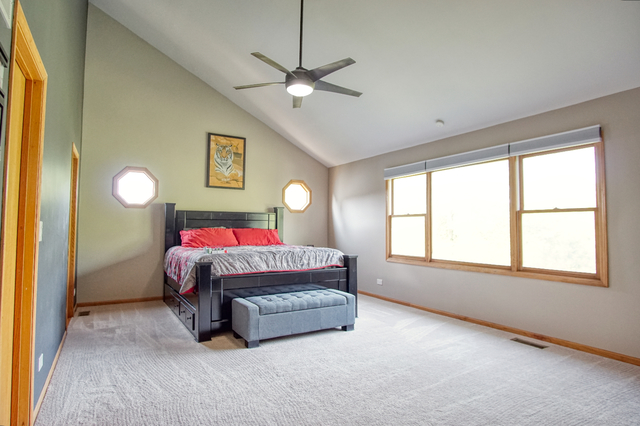 115 North Prospect Avenue Streamwood, IL 60107 - Photo 19 of 41 a bedroom with a bed and window
