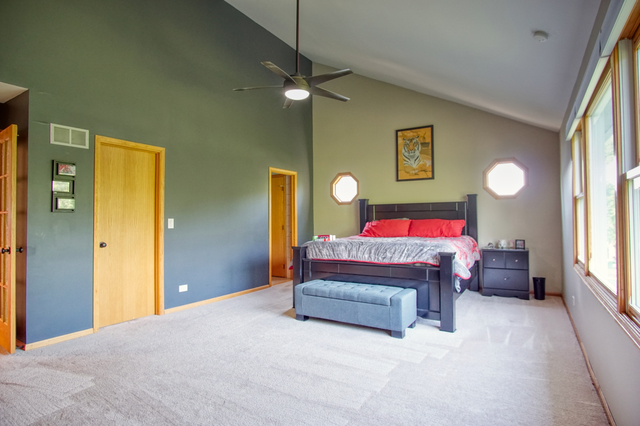 115 North Prospect Avenue Streamwood, IL 60107 - Photo 20 of 41 a bedroom with a bed and window