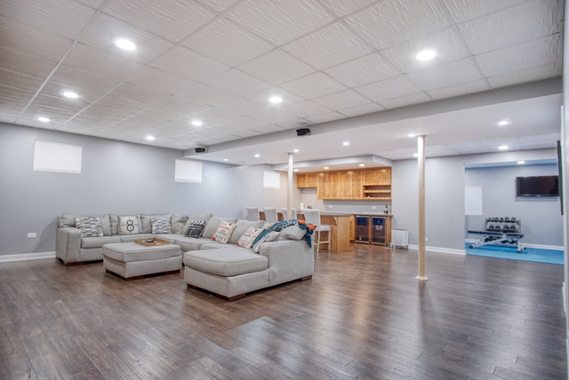 115 North Prospect Avenue Streamwood, IL 60107 - Photo 22 of 41 a living room with furniture and wooden floor