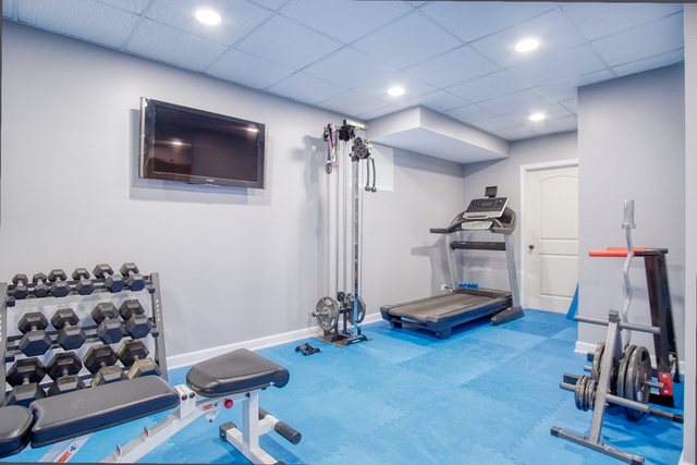 115 North Prospect Avenue Streamwood, IL 60107 - Photo 31 of 41 a view of a room with gym equipment