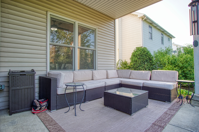 115 North Prospect Avenue Streamwood, IL 60107 - Photo 37 of 41 a view of a couches in the patio