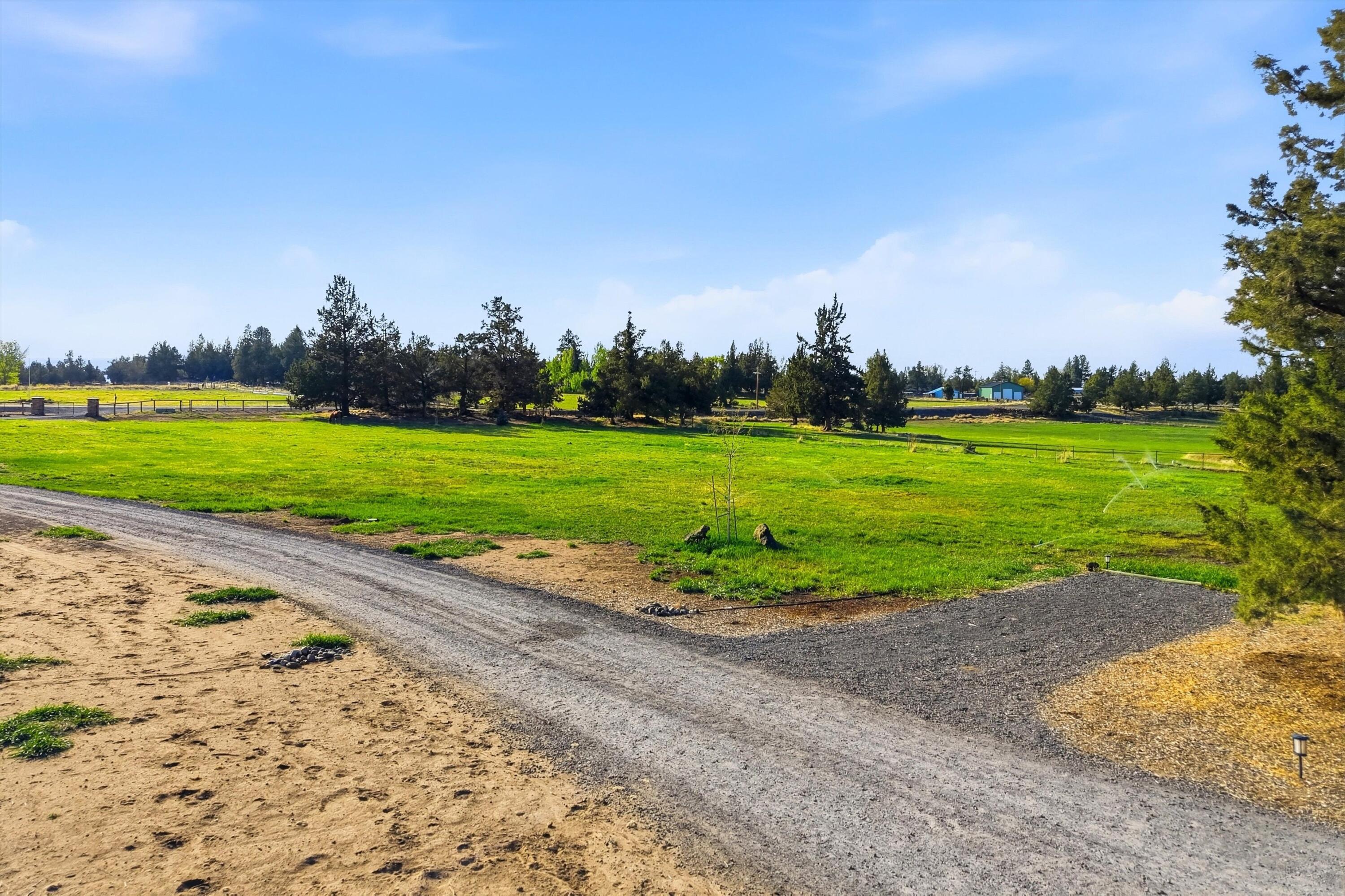 61280 Larsen Road Bend, OR 97702 - Photo 50 of 58 Spend less time managing your property and more time enjoying it! The underground automated irrigation system keeps everything green and gorgeous without the hassle.