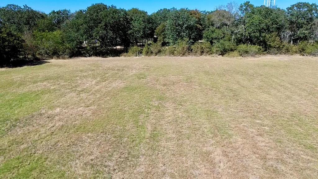 194 South 5th Street Axtell, TX 76624 - Photo 15 of 16 a view of a yard with a tree