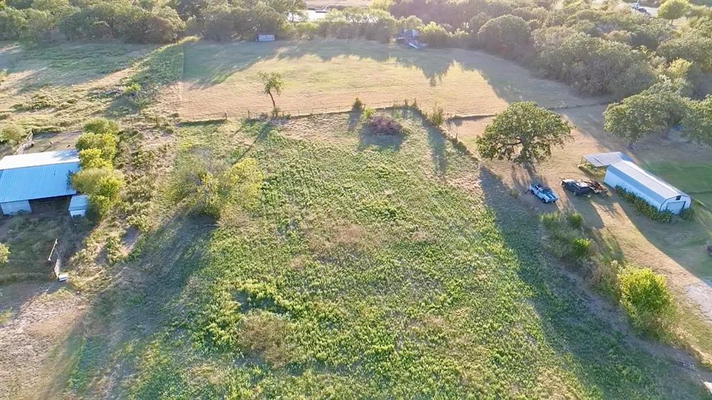 194 South 5th Street Axtell, TX 76624 - Photo 4 of 16 a view of a yard with plants and lake view