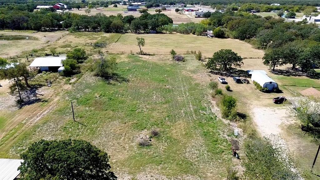 194 South 5th Street Axtell, TX 76624 - Photo 7 of 16 a view of a street with a yard