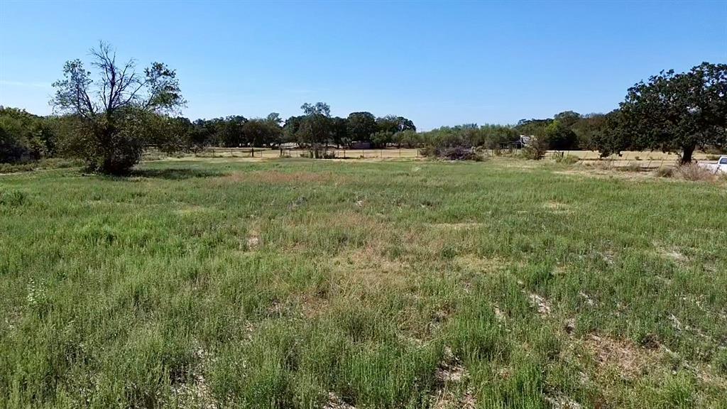 194 South 5th Street Axtell, TX 76624 - Photo 8 of 16 a view of a field with trees in background