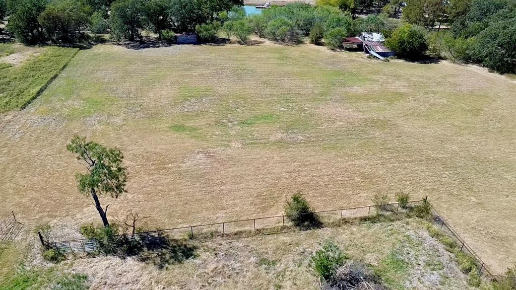 194 South 5th Street Axtell, TX 76624 - Photo 10 of 16 a view of a yard with plants and large trees