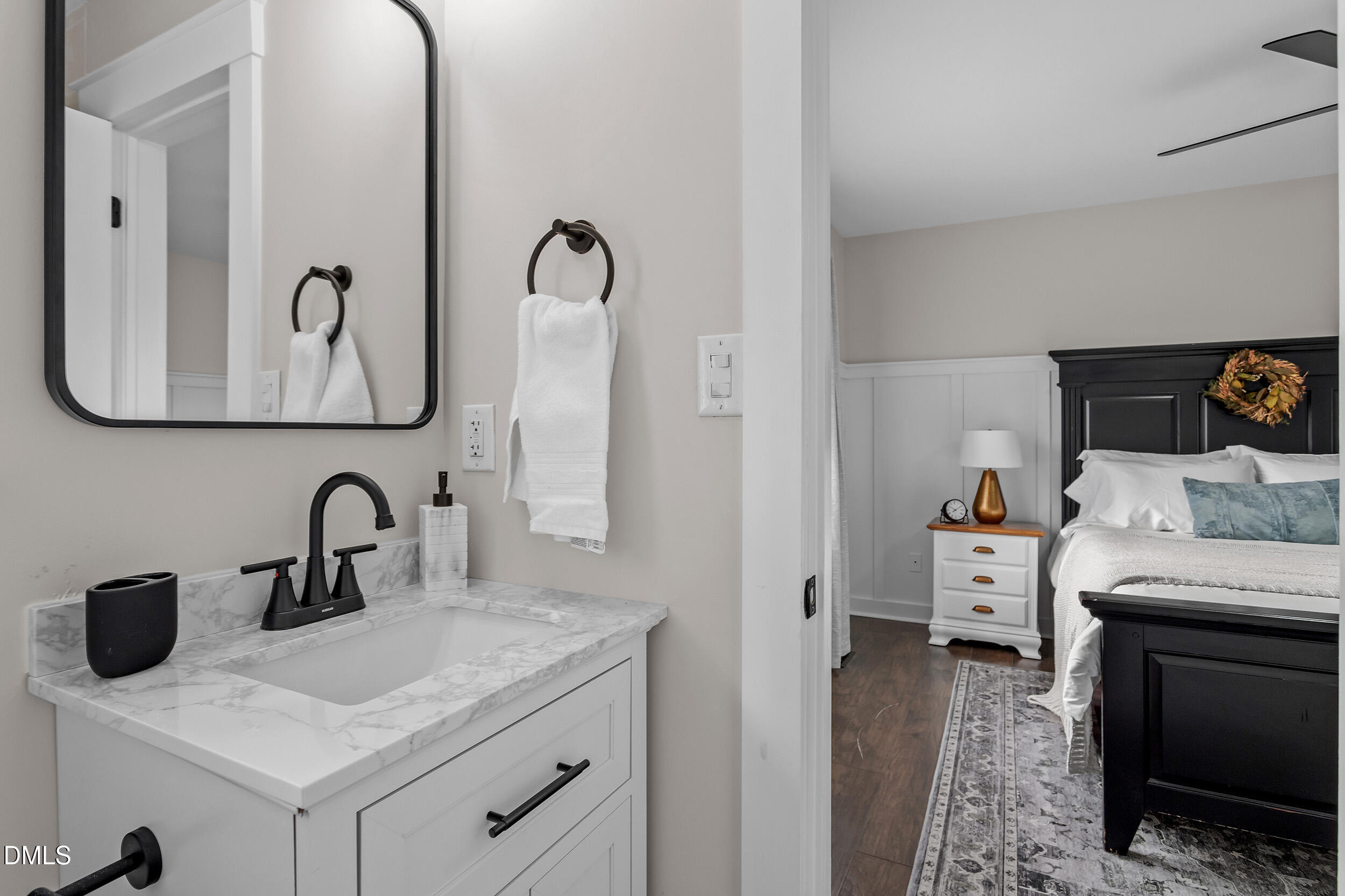3525 Castlegate Drive Raleigh, NC 27616 - Photo 15 of 15 a bathroom with a sink and a mirror