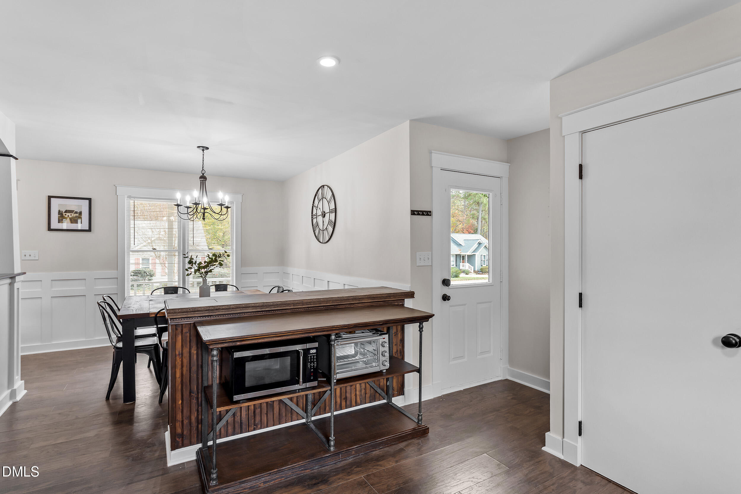 3525 Castlegate Drive Raleigh, NC 27616 - Photo 8 of 15 a view of a dining room with furniture window and wooden floor